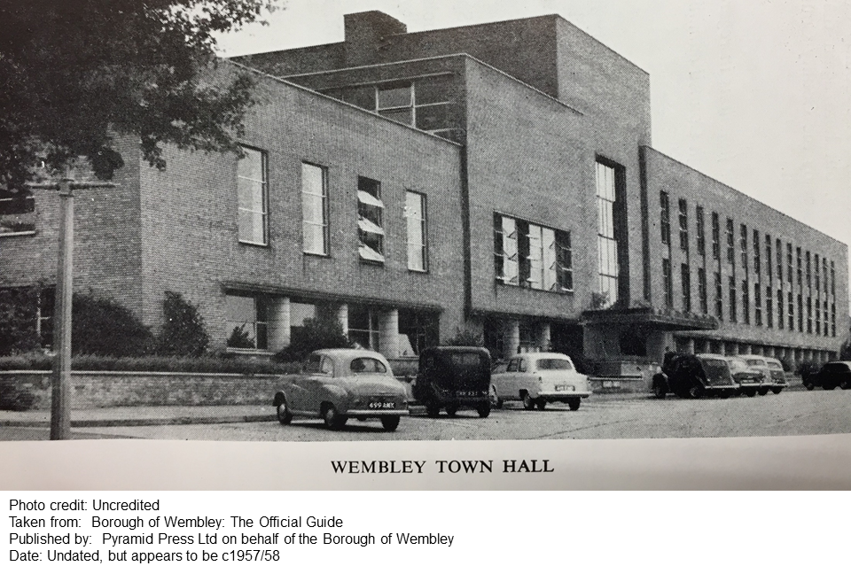 The front elevation of the former Wembley Town Hall. It shows four cuboid sections of different heights and different arrays of rectangular windows. The building is faced in brick.