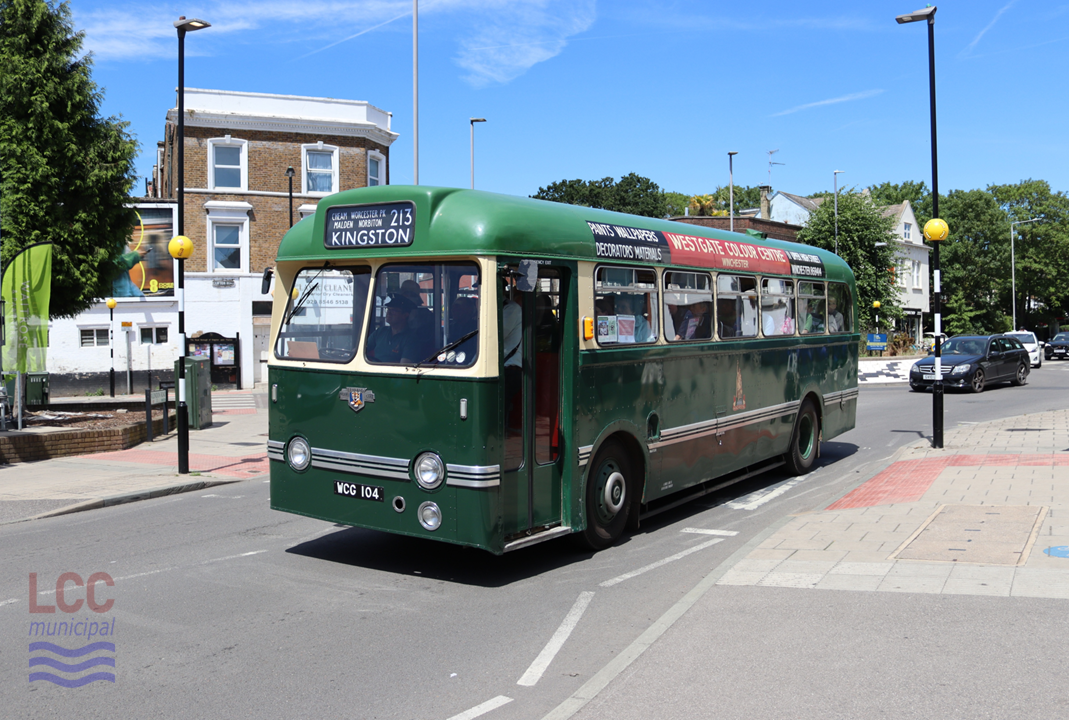 The bus is a single-decker in two tone green and cream. Below the windows, the livery is dark green. A cream band surrounds the windows. The roof and area above the windows is a lighter green.